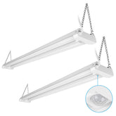LEONLITE motion sensor 4ft LED shop light illuminating a garage workspace clearly