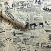 Lependor newspaper-pattern wallpaper roll front view showing design and scale