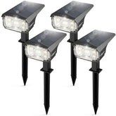 LEREKAM Solar Spot Lights illuminate the front yard for clear pathways and ambiance.