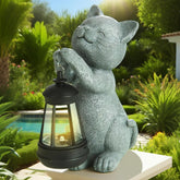 LETITIN solar cat statue with LED light brightens your garden at dusk.