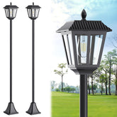 LIANGLOME 68-inch solar lamp post base silhouette glows warmly along the entry path for evening safety.
