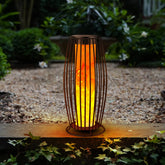 LIANGTUKING solar flame lantern on patio with warm glow and ambient lighting