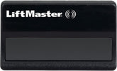 LiftMaster 371LM remote clipped on car visor for quick access.