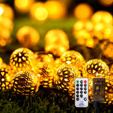 Lightique Moroccan string lights with globe design illuminate spaces with elegant patterns.