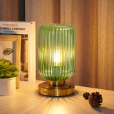 LightRound cordless table lamp with green glass shade for flexible wireless lighting.