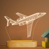 Lightzz airplane night light 3D illusion panel adds calming bedtime ambiance.