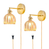 LINSEEDS plug-in wall sconce with tulip amber glass shade for cozy ambience
