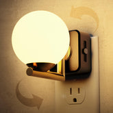 L LOHAS LED night light with ball shade emits warm glow for bedrooms