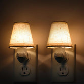 LOIWON vintage plug-in night light 2-pack providing soft warm illumination for nursery and hallway.