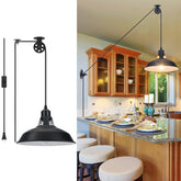 Lomoky plug-in pulley light with barn black shade for warm kitchen island illumination.