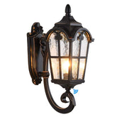LONEDRUID dusk-to-dawn wall light in black with ripple glass shade brightens porches