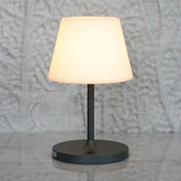 Lotitol outdoor table lamp with warm glow for cozy patio evenings.