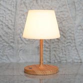 LOTITOL outdoor table lamp in wood grain finish with a 9.6-inch profile for cozy outdoor dining.