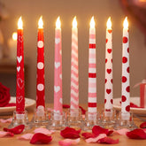 Lounsweer Valentine flameless taper candles in pink heart design provide a warm, safe ambiance.