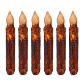 Lpraer real wax pillar candles with drip detail create a warm retro ambiance.
