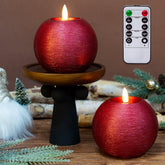 Lumeavetra red glitter round candle for safe, decorative holiday lighting.