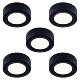 LUMILAND under-cabinet puck light delivers warm task lighting.
