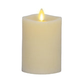 Luminara ivory flameless pillar candle with top flame creates warm evenings.