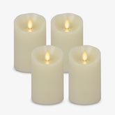 Luminara Ivory pillar candles four-pack provide safe, long-lasting ambient light.