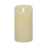 Luminara scalloped-edge candle ivory 4x7 with moving flame for warm ambience.
