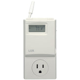 Lux WIN100 programmable thermostat with backlit display for easy night viewing.
