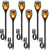 LUYE low voltage torch with dancing flame lights pathways for warm outdoor ambiance.