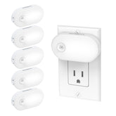 Lyridz plug-in night light with motion sensor illuminating a hallway for safe navigation.