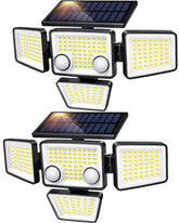 LYWALT four-head solar flood light on wall at dusk, delivering wide coverage.