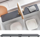 Lyxel faucet mat close-up shows rapid water absorption around the faucet