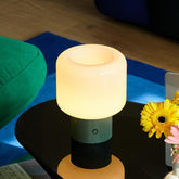 MAGCHARM Halo Mushroom Lamp with glass shade emits soft ambient glow for cozy reading corners.