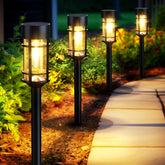 Mancra solar pathway lights 8-pack illuminate walkways wire-free for safe navigation.