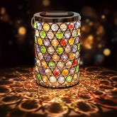 Maromamix mosaic crystal hummingbird lantern casts color on patios.
