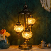 Marrakech Turkish Lamp with bronze base and three globes creates warm mood lighting