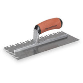 Marshalltown sawtooth notched trowel 11x4.5in blade for efficient large-format tile application.