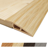 Maxiroc threshold in raw timber tone blends floors for smooth room transitions.