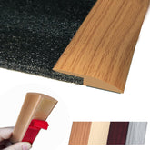 Maxiroc transition strip with adhesive edge for a seamless floor-to-floor join.