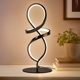 Mayful modern table lamp with spiral design adds elegant ambiance to any space.