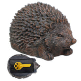 Memeyou hedgehog key hider outdoors blends with garden decor and hides a spare key.