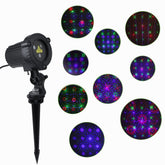 MHAZDZE outdoor laser projector on a wall delivering vivid patterns for holidays.
