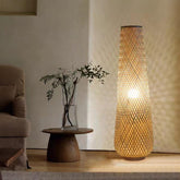 MIXL hand-woven bamboo lamp creates a warm, cozy living room ambiance.