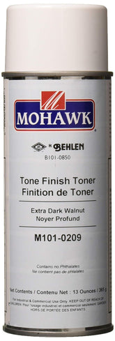 Mohawk Tone Finish Toner in Extra Dark Walnut pour demonstrates fade-resistant color for furniture repair.