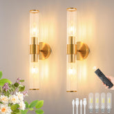 Morauroral gold battery-operated wall sconce pair creates warm living room ambiance.