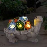 Nacome solar garden turtle statue at dusk with inviting LED glow.
