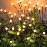 NBQQ Solar garden light with 32 LED swaying stalks for enchanting nighttime ambiance.