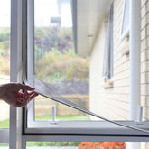 NeatiEase adjustable window screen side view showing adaptable fit for various openings
