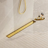 Neodrain 24in gold linear drain with tile insert cover for a seamless shower floor