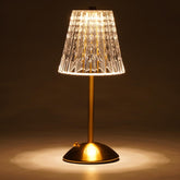 Nusogon cordless table lamp with crystal shade for warm, elegant ambiance.