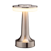 O’Bright portable LED table lamp in silver provides flexible bedside lighting.
