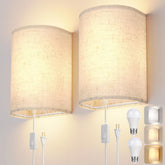 OCATO plug-in wall sconces set mounted on wall for subtle ambient lighting.