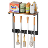 Olakee broom holder wall mount with shelf keeps brooms accessible off the floor.